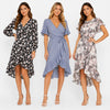 Three women wearing floral and striped dresses on a white background