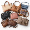 Wholesale second hand clothing mix, assorted styles, UK high street brands, pre-loved garments for resale