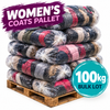 A pallet stacked with large clear plastic bags filled with mixed coats and outerwear garments in black, gray, pink, beige, and green tones. Prominent overlaid text reads 'WOMEN'S COATS PALLET' and '100kg BULK LOT' on a white background.